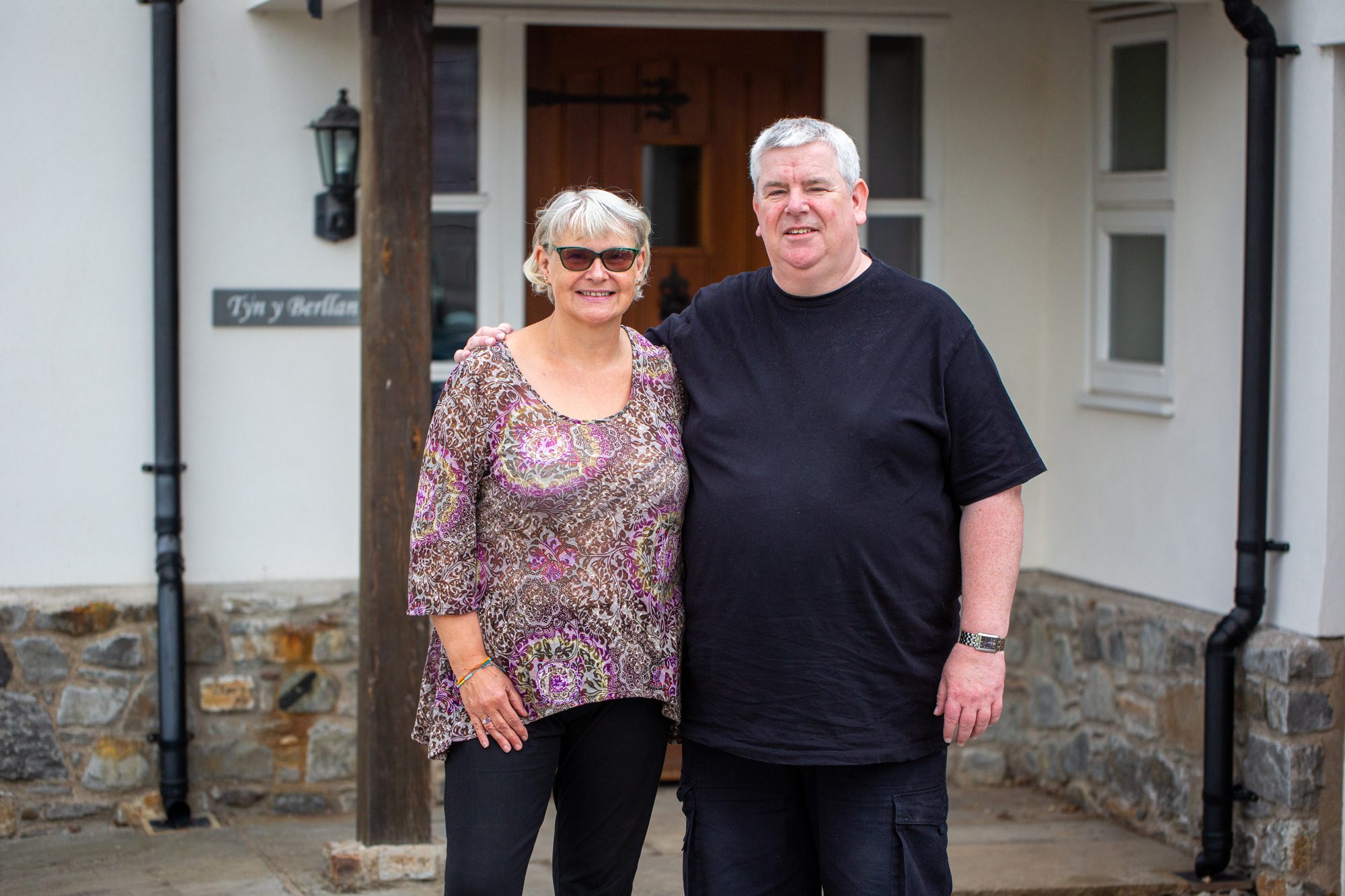 Foster carer couple smiling